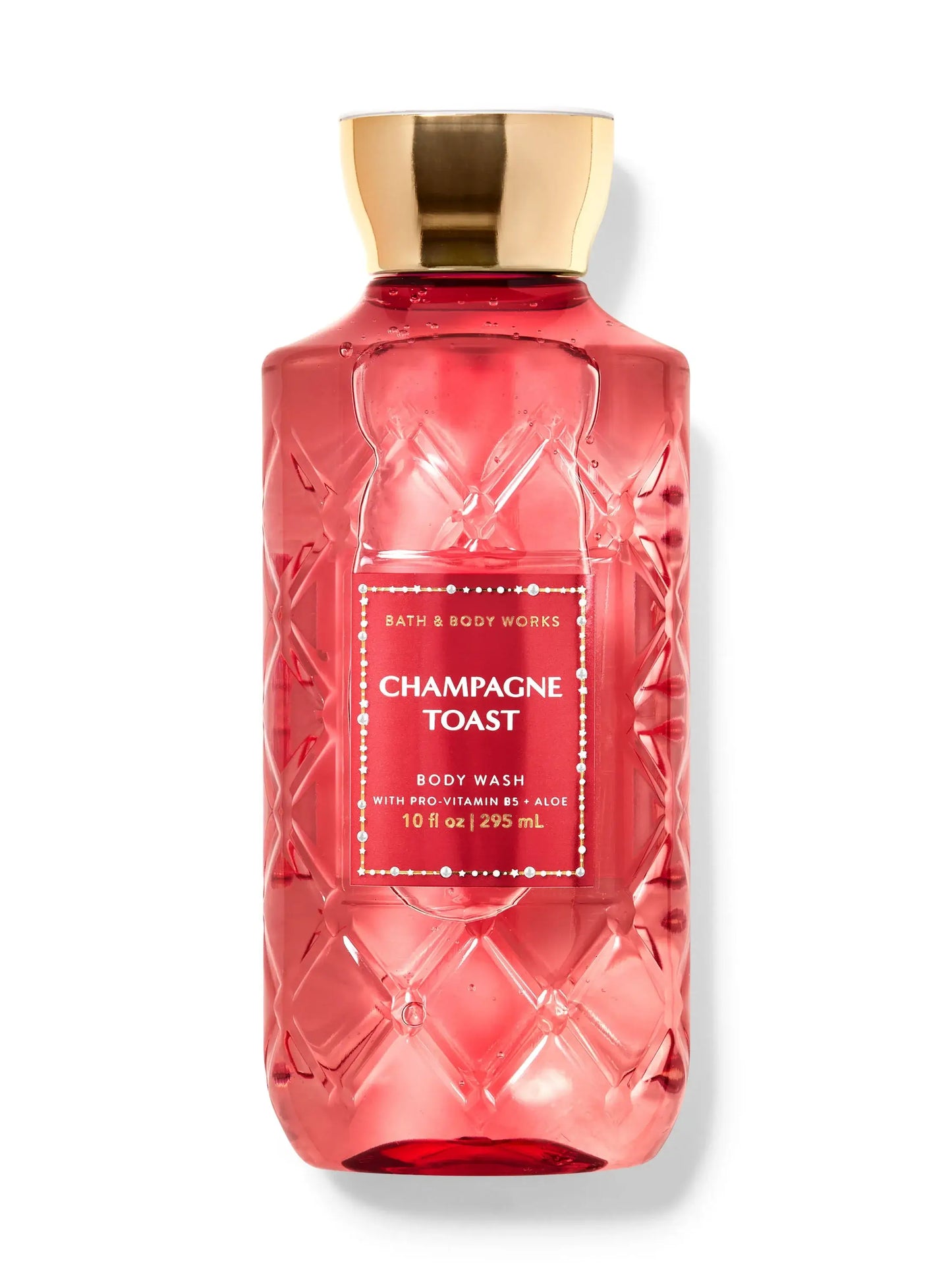 "Champagne Toast body wash bottle with golden cap and textured design, enriched with provitamins B5 and aloe, 295 mL."